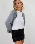 black Vegan leather skirt. Hook and eye and zipper fly. Five pocket construction. Fully lined. black fauz leather skirt. going out skirt. fall outfit. fall skirt