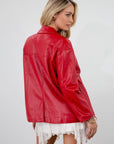 Vegan leather blazer. Single breast. Collar neckline. Front button down closure. Side pockets. Back slit. Fully lined. red leather blazer