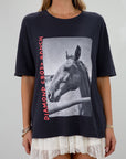 Graphic printed knit tee. Crewneck. Short sleeves. Unlined.