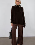 Ribbed knit pants. Elastic waistband. Side pockets. Unlined. brown slounchy pants. cute casual pant. fall outfit.