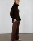 Ribbed knit pants. Elastic waistband. Side pockets. Unlined. brown slounchy pants. cute casual pant. fall outfit.