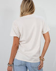 Graphic printed knit tee. Crewneck. Short sleeves. Unlined. david bowie graphic tee.