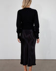 Black satin maxi skirt. Elastic waist. Side hook and eye and zipper closures. Unlined. fall skirt. fall bottom. holiday skirt