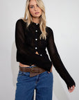 black Crochet knit cardigan. Long sleeves. Front button down closures. Unlined. fall top. fall outfit.