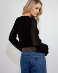 black Crochet knit cardigan. Long sleeves. Front button down closures. Unlined. fall top. fall outfit.