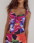 Printed satin bustier top. Fixed straps. Underwire cups. Boning in bodice. Exposed back zipper closure. Fully lined. Floral bustier top. floral dress set