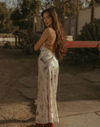 Printed satin maxi dress. Halter neckline with back tie closure. Side zipper closure. Fully lined. horse dress. ranch shoot.