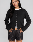 black Knit long sleeve cardigan
Rolled collar
Button down closure
Unlined
black cardigan