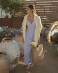 Striped woven maxi dress. Adjustable straps. Elastic smocked back. Back hook and eye and zipper closures. Unlined. European summer. European summer dress. European summer aesthetic. Tuscany outfit inso. Tuscany aesthetic. Summer dress. blue and white striped maxi dress. striped maxi dress. summer outfit. everyday dress. vacation dress. outfit to wear to tuscany. nice dinner dress. dinner dress. day dress.