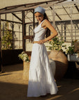 Tiered woven maxi skirt. Elastic waistband. Side pockets. Fully lined. European summer vacation. European summer outfit. European summer. European summer skirt. European summer aesthetic. Tuscany outfit inso. Tuscany aesthetic. Summer skirt. white maxi skirt. summer outfit. everyday skirt. vacation skirt. outfit to wear to tuscany.