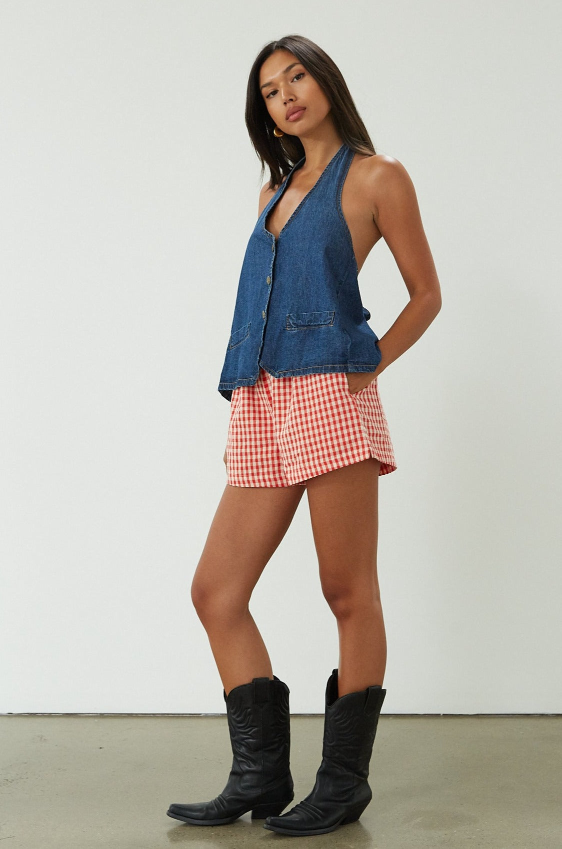 Gingham woven shorts. Elastic waistband. Side and back pockets. Fully lined. red gingham shorts. summer shorts. red boxer shorts. red gingham boxer shorts. cute casual outfit. cute lounge shorts