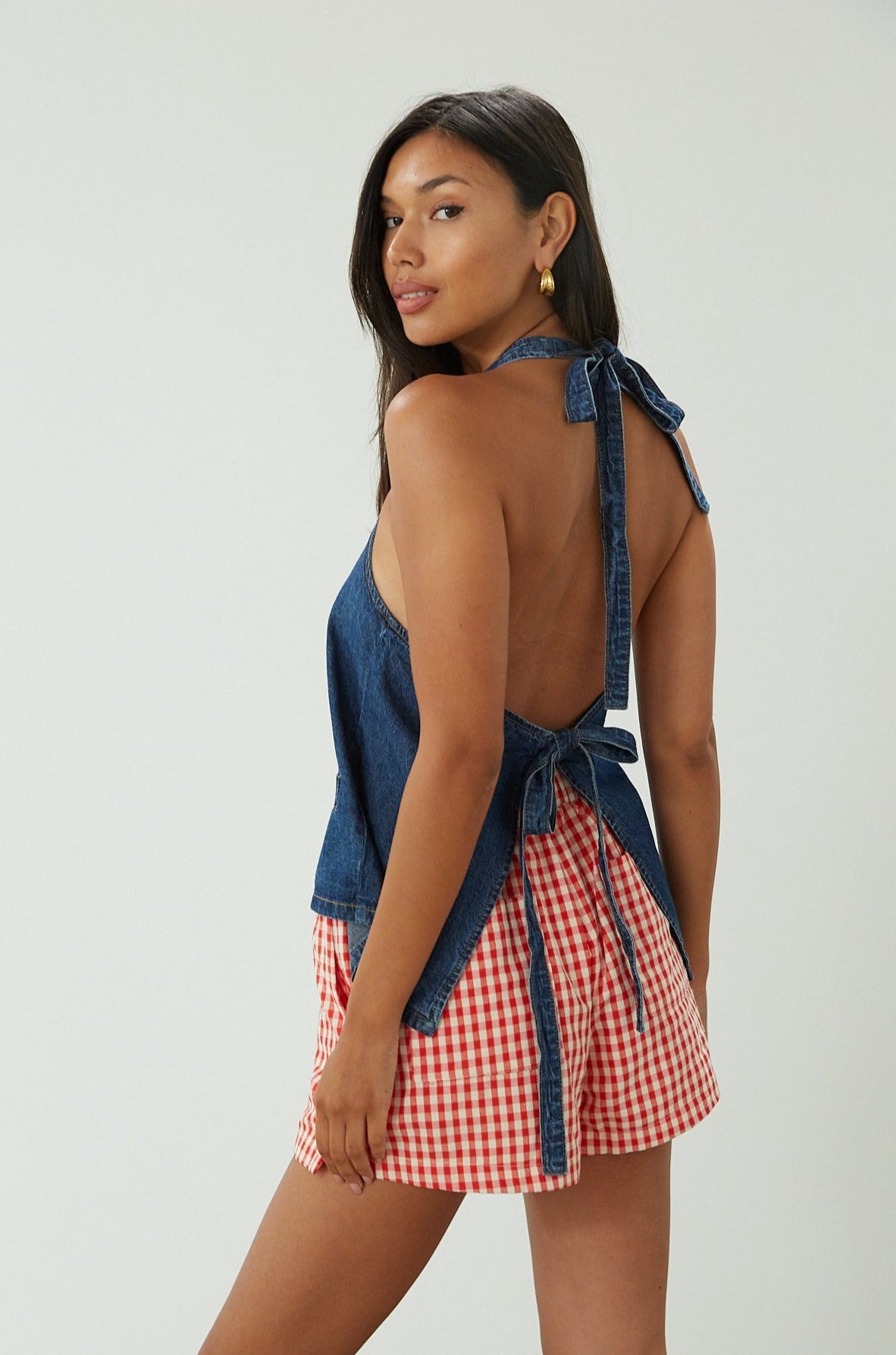 Gingham woven shorts. Elastic waistband. Side and back pockets. Fully lined. red gingham shorts. summer shorts. red boxer shorts. red gingham boxer shorts. cute casual outfit. cute lounge shorts