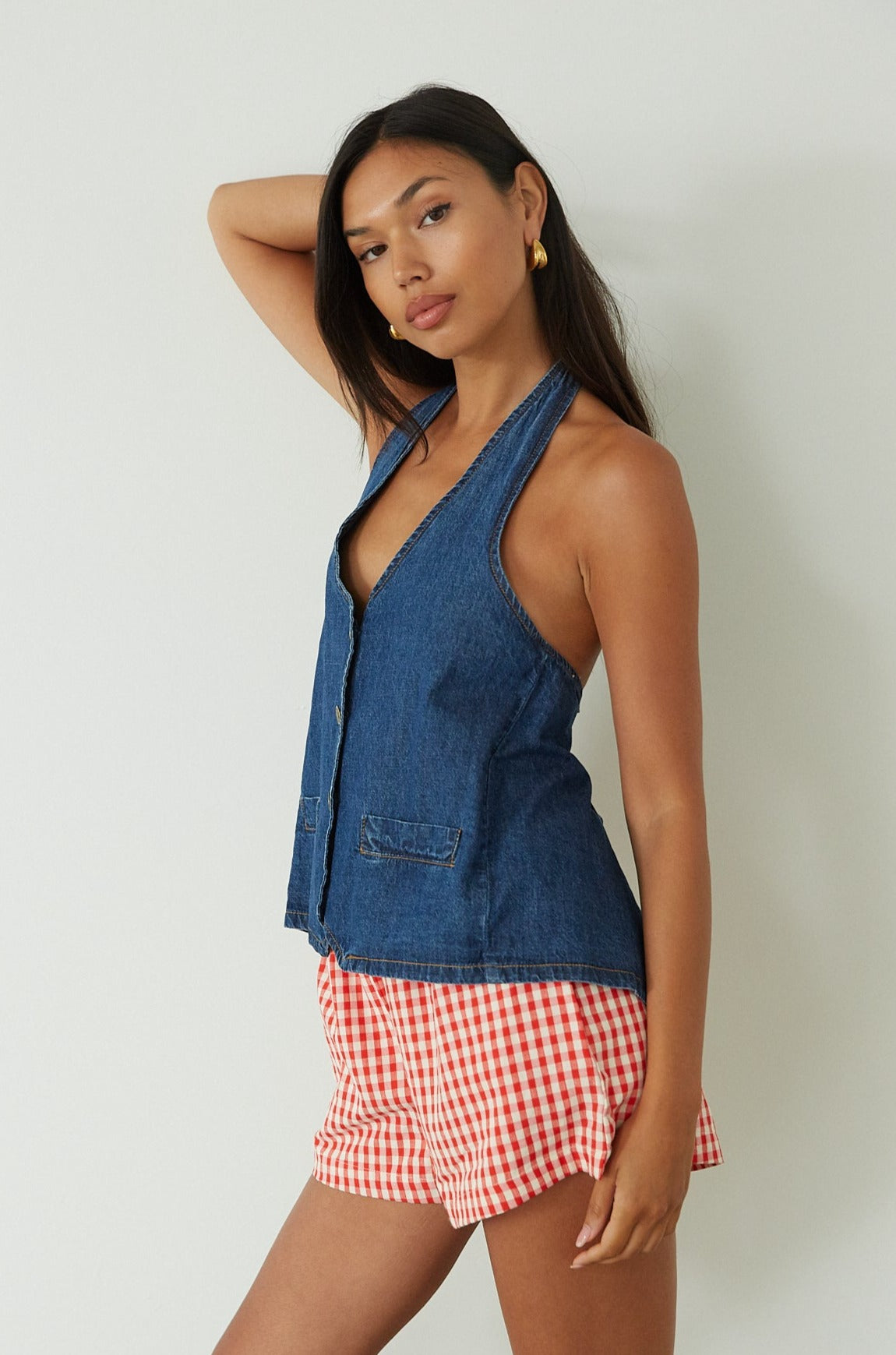 Gingham woven shorts. Elastic waistband. Side and back pockets. Fully lined. red gingham shorts. summer shorts. red boxer shorts. red gingham boxer shorts. cute casual outfit. cute lounge shorts