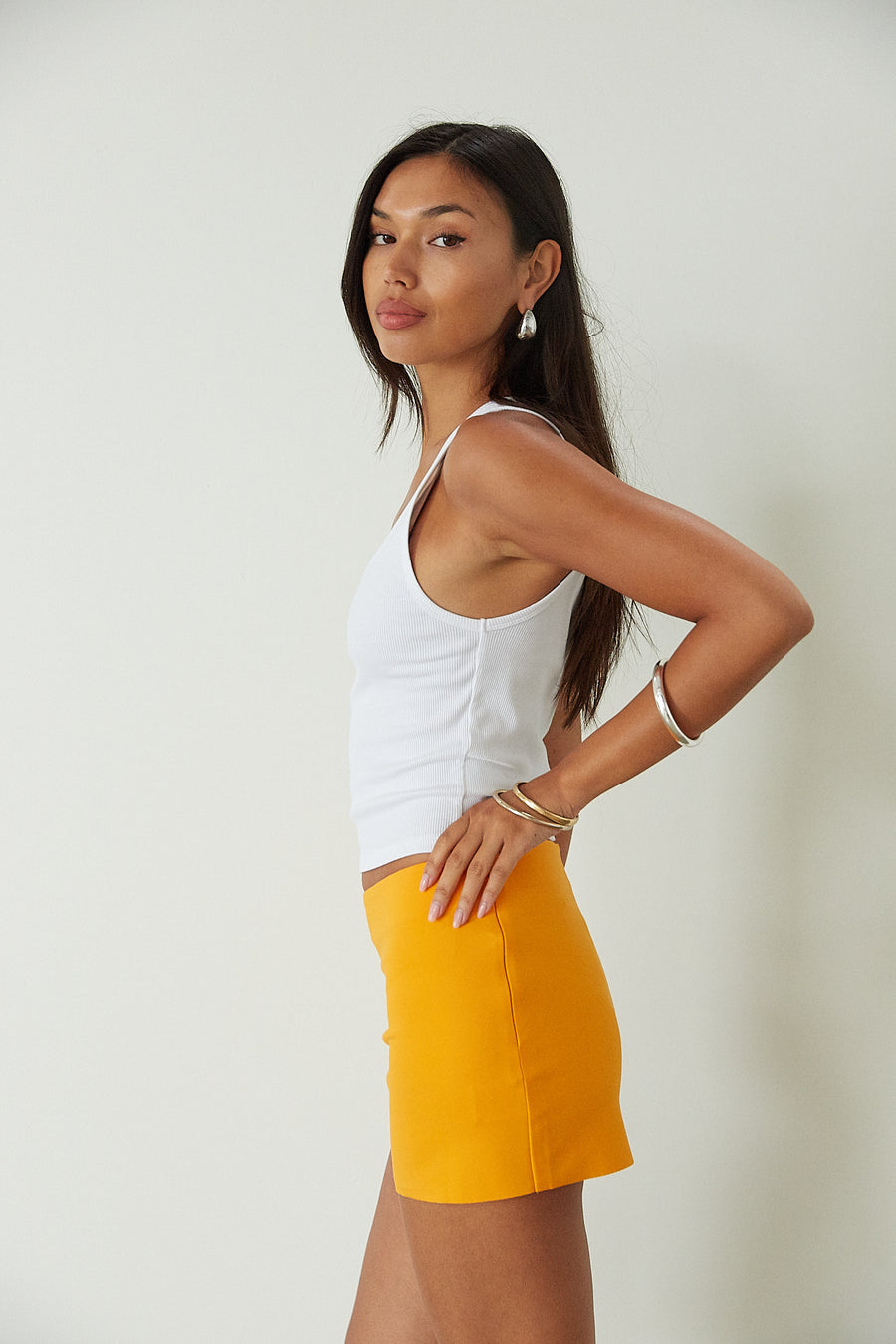 orange mini skirt. summer bottoms. summer skirt. going out outfit. going out skirt. summer outfit