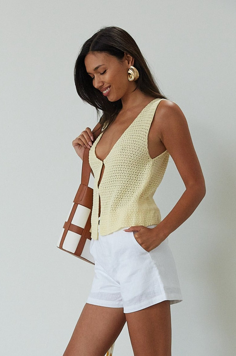 Woven shorts. Button and zipper fly. Side pockets. Faux back pockets. Fully lined. white shorts. white linen shorts. summer shorts. summer bottoms. summer outfit