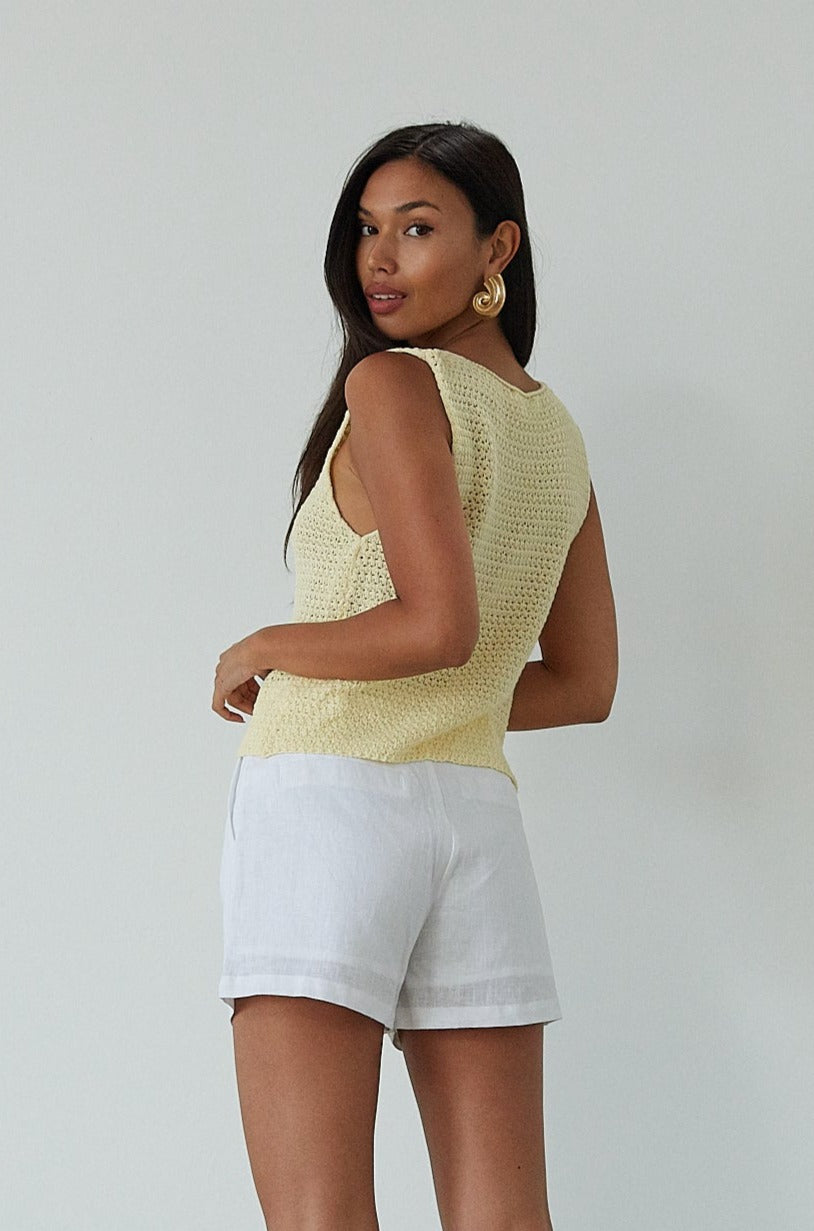 Woven shorts. Button and zipper fly. Side pockets. Faux back pockets. Fully lined. white shorts. white linen shorts. summer shorts. summer bottoms. summer outfit