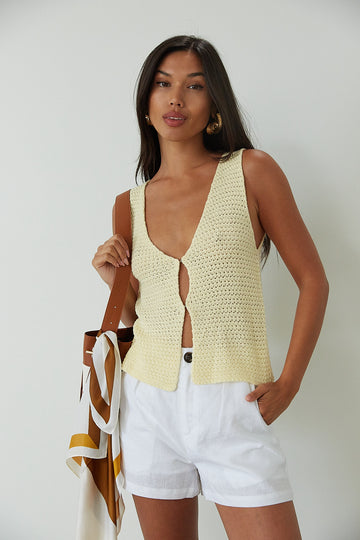 Crochet knit sleeveless top. Front hook and eye closures. Unlined. yellow crochet top. yellow front clip top. yellow tank top. summer top. summer tank top. going out top. 