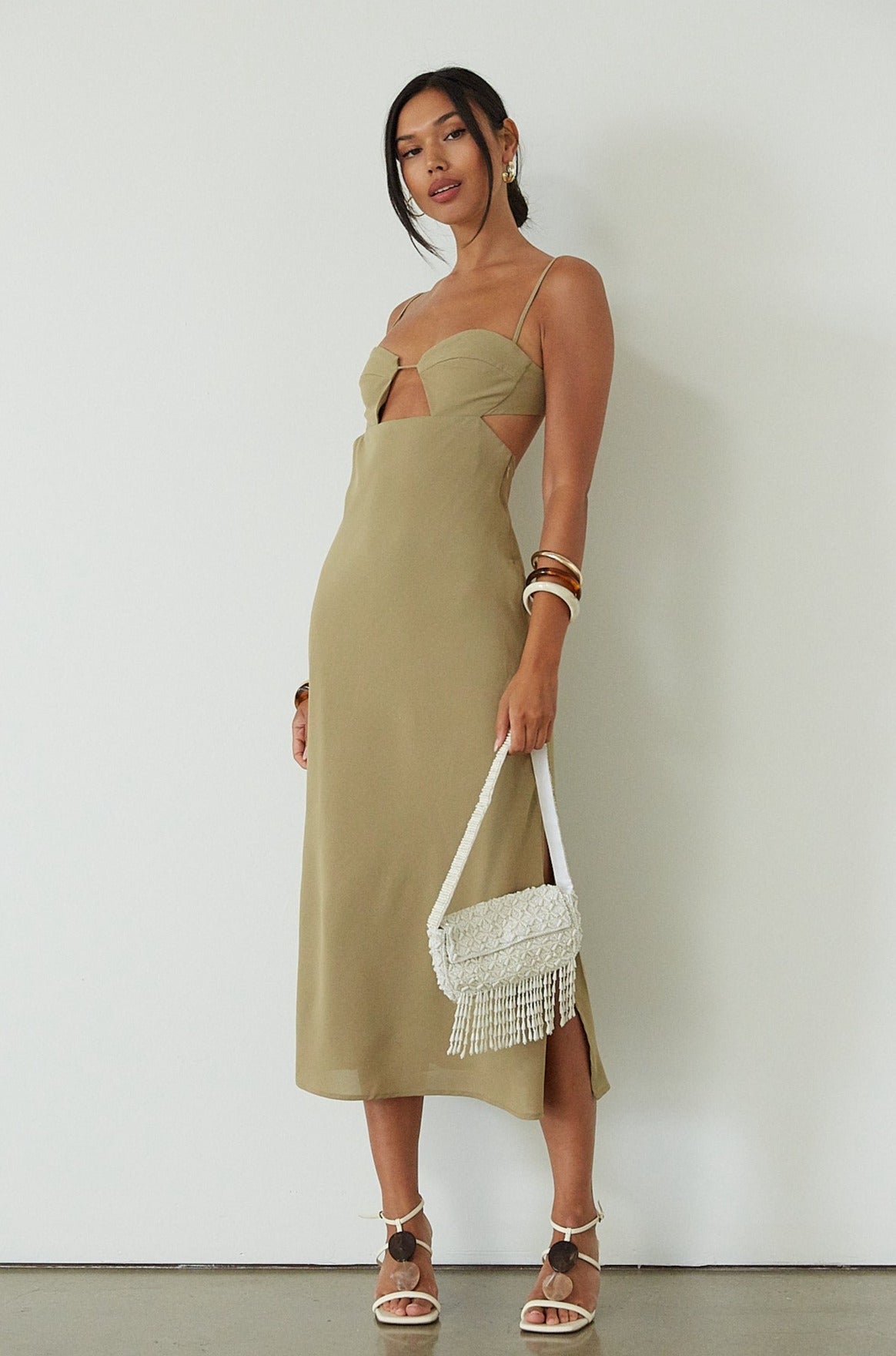 sage green maxi dress. green maxi dress. wedding guest dress. dress with side slit. evening dress. dress for nice dinner