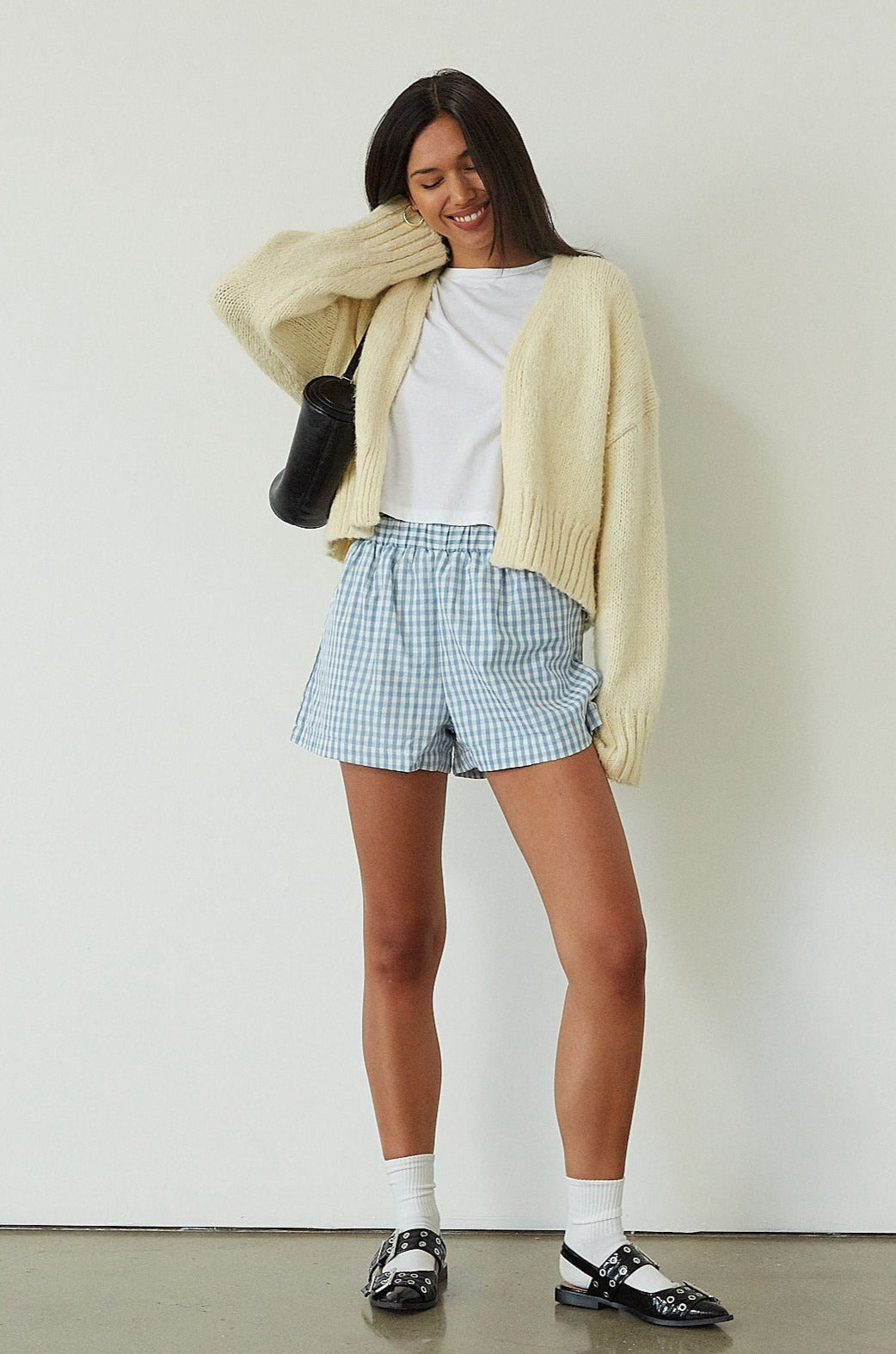 Gingham woven shorts. Elastic waistband. Side and back pockets. Fully lined. blue and white shorts. blue and white gingham shorts. blue and white boxer shorts. gingham checked boxer shorts. summer shorts. cute casual. lounge shorts
