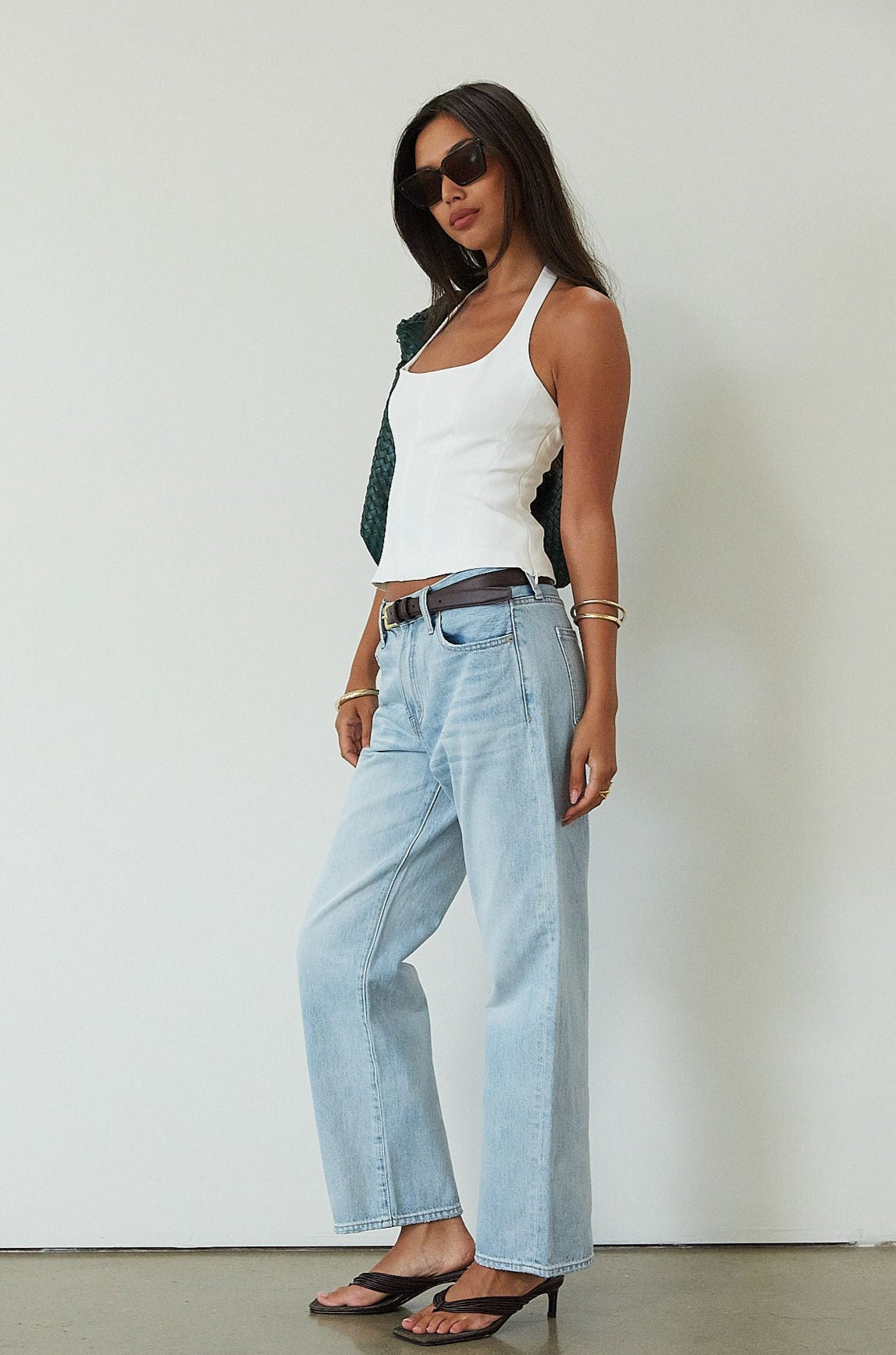 Mid rise bowed straight leg jeans. Button and zipper fly. Five pocket construction.&nbsp;Straight leg bows at the knees for an arched, barrel leg silhouette. Ankle length crop with a clean hem. No stretch.&nbsp;