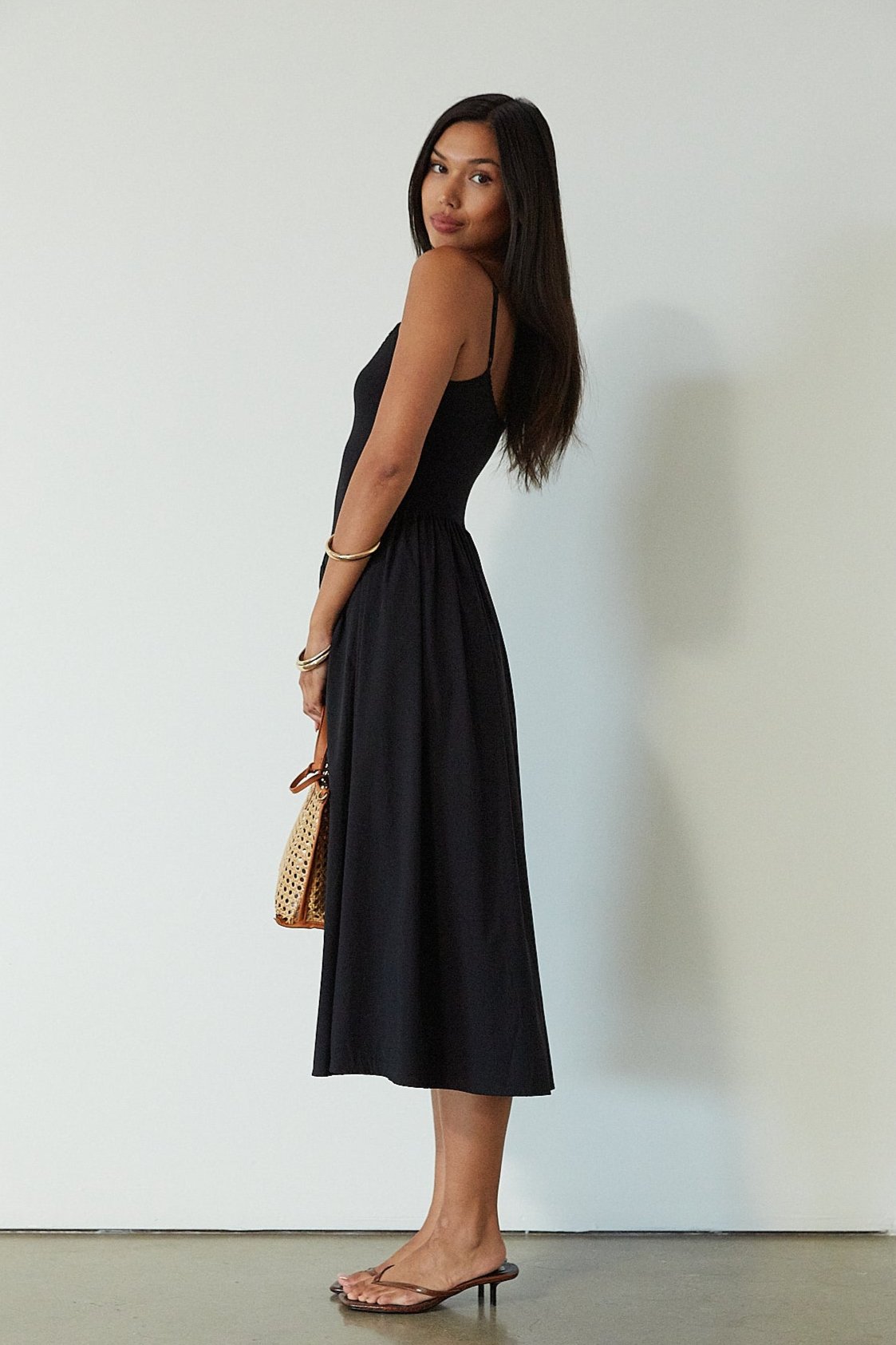 Knit midi dress. Ribbed knit bodice. Adjustable straps. Partially lined. Black midi dress. summer dress. 