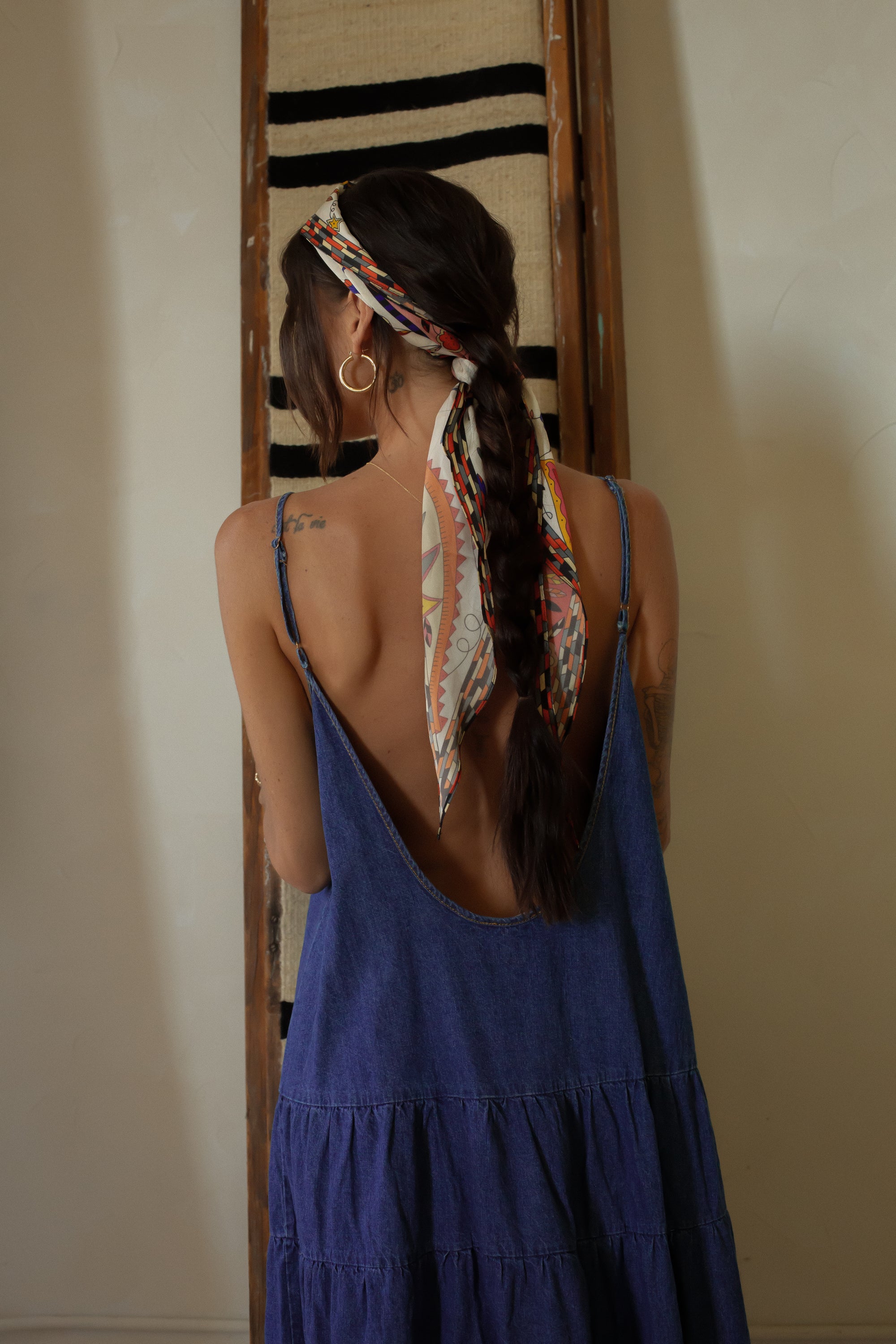 Tiered denim maxi dress. Adjustable straps. V-neckline. Front slit. Low back. Unlined. European summer aesthetic. Tuscany outfit inso. Tuscany aesthetic. Summer dress. denim maxi dress. summer outfit. everyday dress. vacation dress. outfit to wear to tuscany. day dress. 