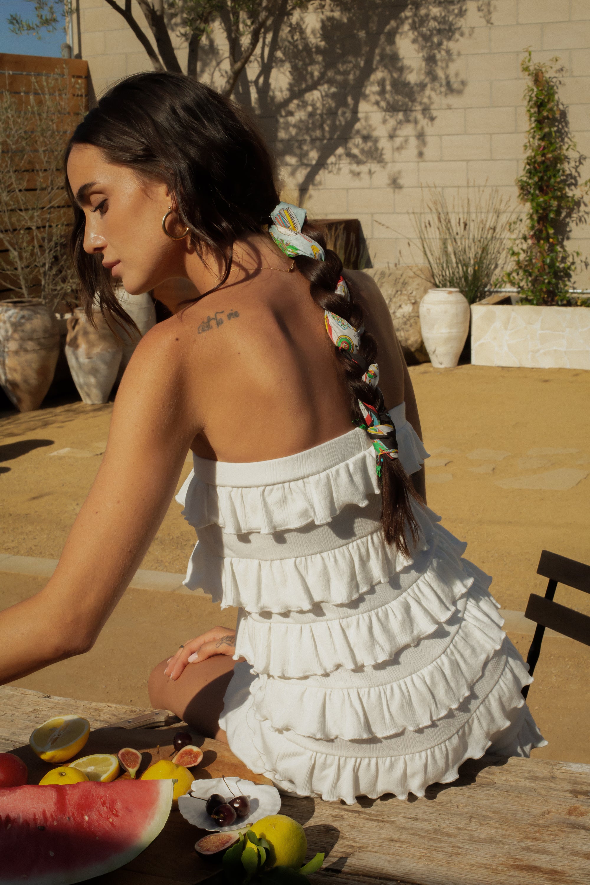 Ruffle knit romper. Strapless elastic neckline. Unlined. European summer outfit. European summer. European summer romper. European summer aesthetic. Tuscany outfit inso. Tuscany aesthetic. Summer romper. white romper. white ruffle romper. summer outfit. everyday romper. vacation romper. outfit to wear to tuscany. strapless romper