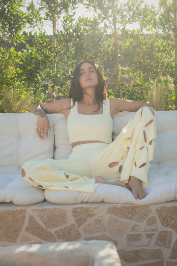 European summer vacation. European summer outfit. European summer. European summer top. European summer aesthetic. Tuscany outfit inso. Tuscany aesthetic. Summer top. yellow knit set. knit set. knit pant set. yellow floral cut out pant. yellow knit tank top
