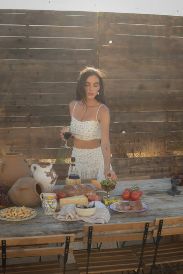 Floral printed ruched woven crop top. Adjustable straps. Side zipper closure. Elastic smocked back. Fully lined. European summer aesthetic. Tuscany outfit inso. Tuscany aesthetic. Summer top. floral cropped tank top. summer outfit. vacation top. outfit to wear to tuscany. skirt and tank top set. day outfit. wine tasting outfit. bridal shower outfit. engagement party dress.