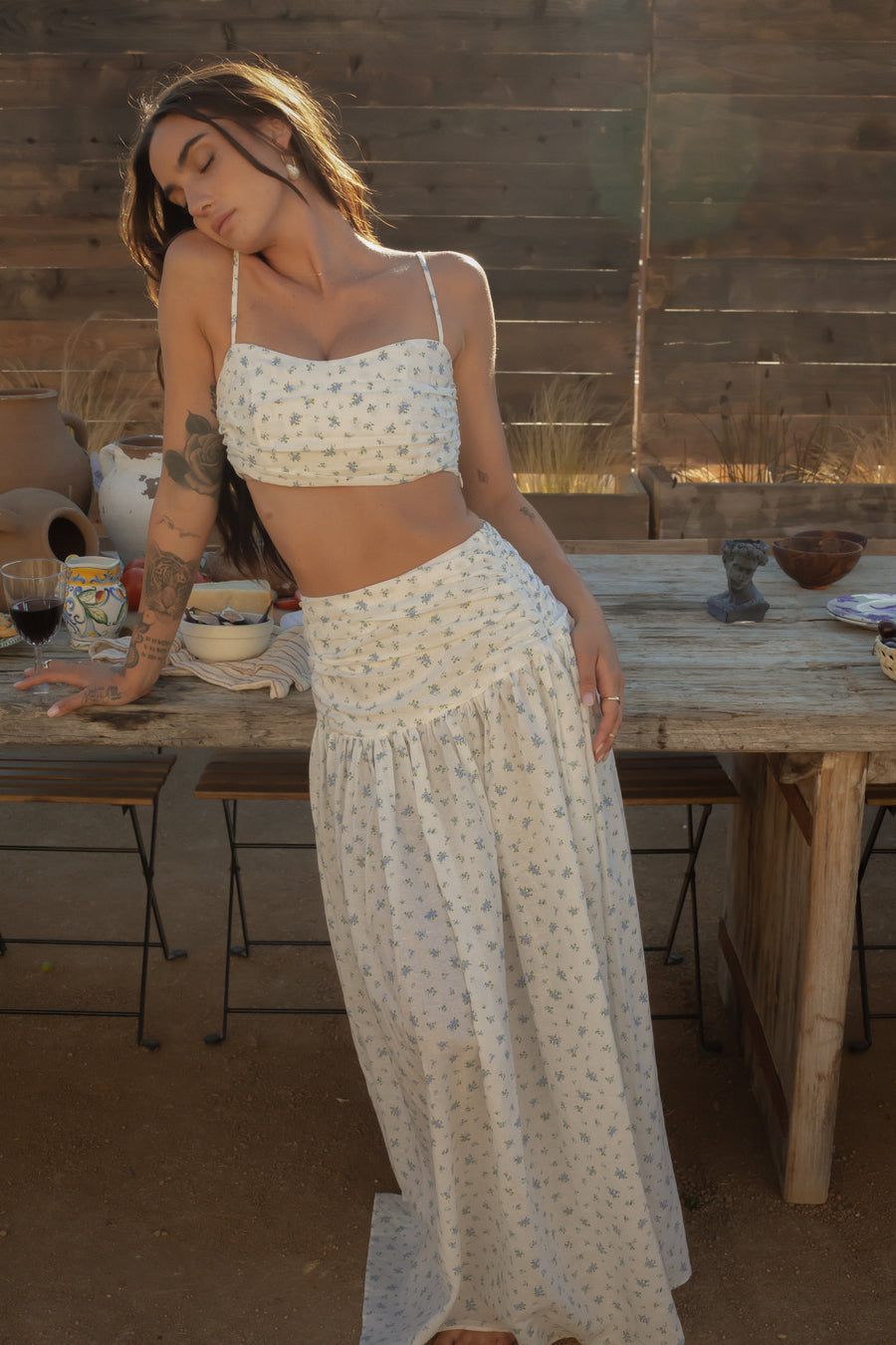 Floral printed woven skirt. Side hook and eye and zipper closures. Ruched waist. Side pockets. Unlined. European summer aesthetic. Tuscany outfit inso. Tuscany aesthetic. Summer skirt. floral maxi skirt. summer outfit. vacation skirt. outfit to wear to tuscany. skirt and tank top set. day outfit. wine tasting outfit. bridal shower outfit. engagement party dress.