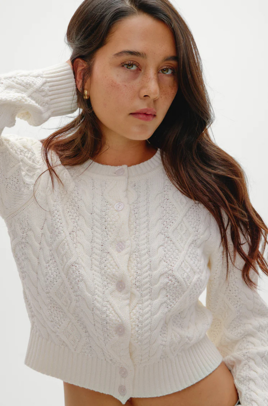 white Cable knit cardigan sweater
Snug feel with a slightly cropped fit
Crafted with custom Frankies Bikinis buttons
Ribbed detailing on hem, sleeve openings, and neckline
Cotton
fall sweater
fall cardigan
fall outfit