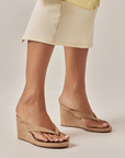 Retro thong wedge mule
Mid wedge heel
Open round toe
Exposed heel counter
Synthetic upper, lining and outsole
Heel height 9cm
tan suede wedge heel