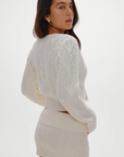 white Cable knit cardigan sweater
Snug feel with a slightly cropped fit
Crafted with custom Frankies Bikinis buttons
Ribbed detailing on hem, sleeve openings, and neckline
Cotton
fall sweater
fall cardigan
fall outfit