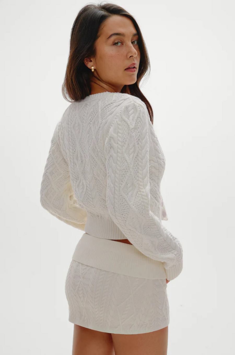 white Cable knit cardigan sweater
Snug feel with a slightly cropped fit
Crafted with custom Frankies Bikinis buttons
Ribbed detailing on hem, sleeve openings, and neckline
Cotton
fall sweater
fall cardigan
fall outfit