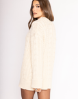 Cable knit sweater dress. Crewneck. Long cuffed sleeves. Unlined. beige sweater dress. fall sweater dress. holiday look