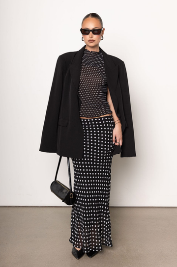 black and white Polka dot maxi skirt
Side zipper closure
Lined