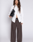 white Long sleeve collared top
Button down top
Ruched waist/back
Length: 32"
100% Cotton
cute business casual long sleeve top