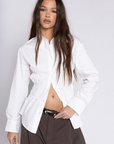 white Long sleeve collared top
Button down top
Ruched waist/back
Length: 32"
100% Cotton
cute business casual long sleeve top