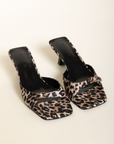 Leopard low stiletto mule heel
Open square toe
Wide, tapered toe strap
Buckle detailing on toe
Slip on design
Open heel counter
Synthetic