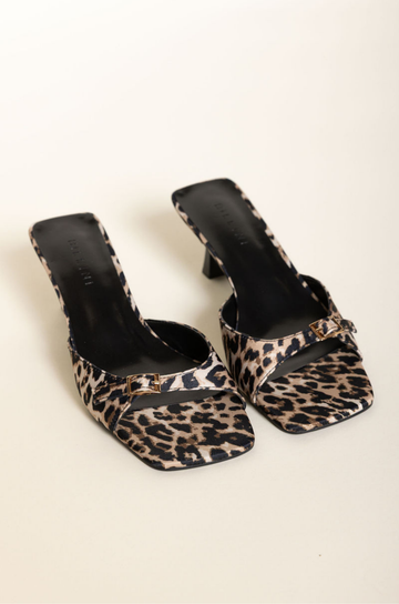 Leopard low stiletto mule heel
Open square toe
Wide, tapered toe strap
Buckle detailing on toe
Slip on design
Open heel counter
Synthetic