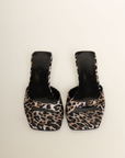 Leopard low stiletto mule heel
Open square toe
Wide, tapered toe strap
Buckle detailing on toe
Slip on design
Open heel counter
Synthetic