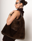 brown Faux fur tote
One inner zip pocket
Two inner slip pockets
Button closure
Imported
Polyester
brown fur bag
fall bag
fall accessories