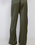 olive green Silk track pant
Elastic waistband
Side stripe
fall transition outfit