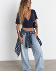 blue Knit batwing top
Short sleeve
V neckline
V open back
Elastic waistband
Cinched sides
Unlined