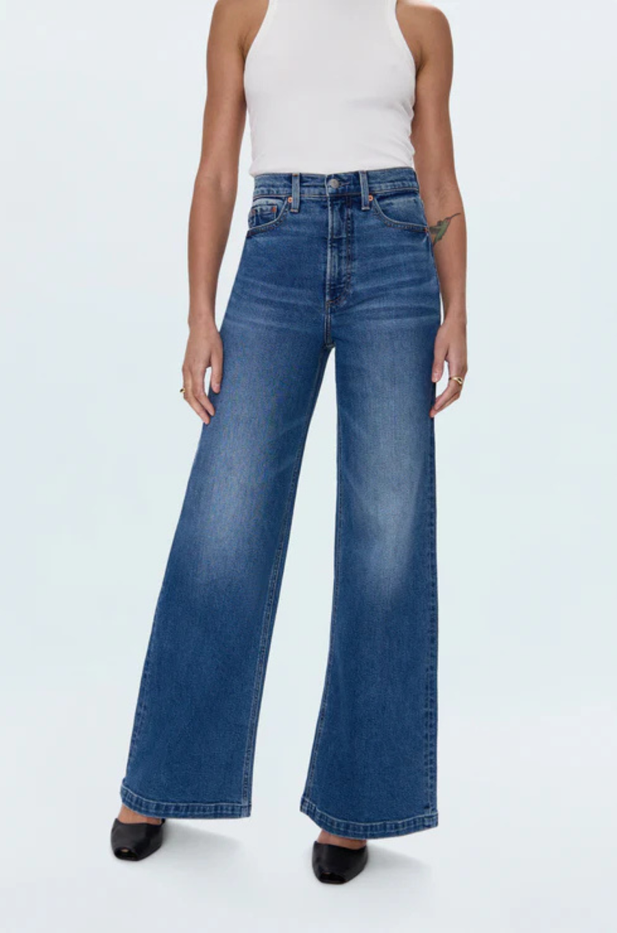 Relaxed, ultra wide leg silhouette
High rise waist
Comfort stretch denim
Waist: 26" / Rise: 12" / Length: 33"
Cotton/Spandex
medium wash blue denim jeans