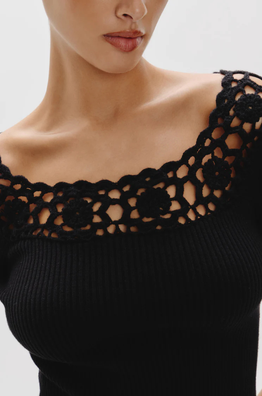 Knit crochet mini dress
Designed in Cloud Knit fabric
Drop waist dress
Soft crochet fabric on the neckline and skirt
Tie detail on the skirt
Crochet design on neckline and skirt
FRANKIES BLACK KNIT CROCHET MINI DRESS
3/4 SLEEVE