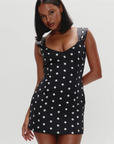black and white Polka dot mini dress
Medium-weight dress fabrication with subtle shine
Sweetheart neckline
Princess seams on front and back for shaping
Side seam zipper