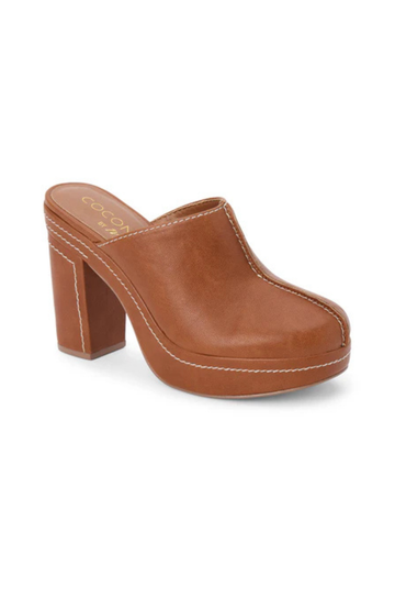 Vegan faux leather platform mule heel
Block heel and contrast stitching
Padded insole
Slip-on style
4.5" heel
1.25" platform
Faux leather
Manmade outsole
brown platform mule heel