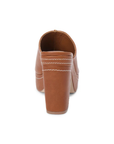 Vegan faux leather platform mule heel
Block heel and contrast stitching
Padded insole
Slip-on style
4.5" heel
1.25" platform
Faux leather
Manmade outsole
brown platform mule heel