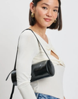 Barrel shoulder bag
Cylindrical silhouette shoulder bag
Versatile strap - over the shoulder or crossbody
Adjustable Shoulder Strap
Zip closure
Vegan Leather
black barrel bag
black barrel purse